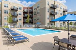 2BR Downtown Elmhurst | Pool, Gym, Kings, Garage